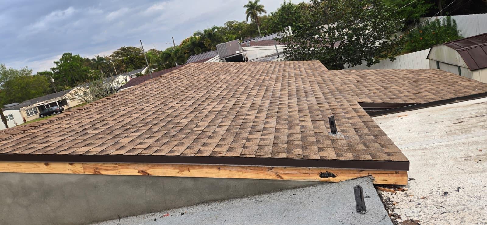 After: New architectural shingle roof installation
